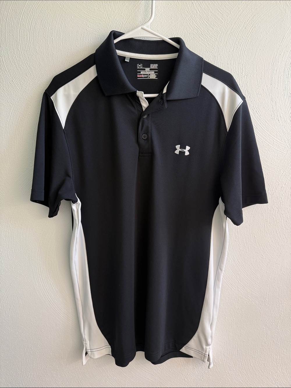 Under Armour Men’s Black and White loose fit Polo